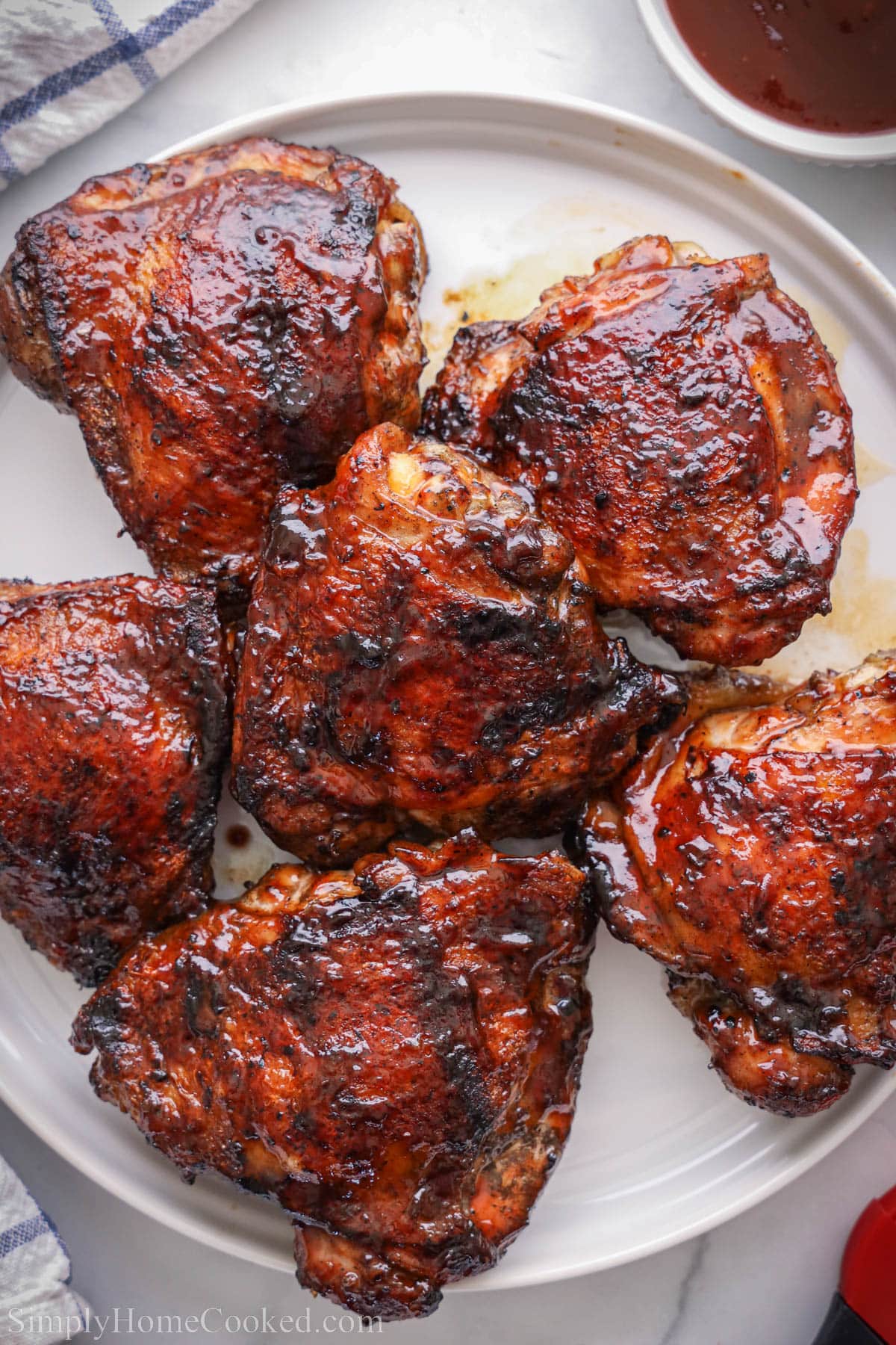 Plate of Grilled BBQ Chicken Thighs.
