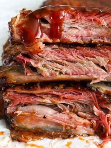 Vertical image of stacked Smoked Ribs