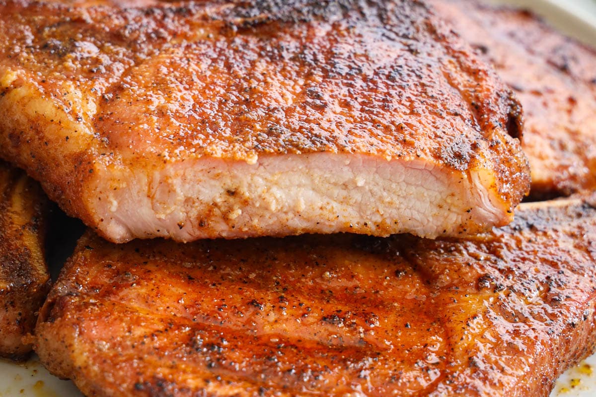 Sliced Smoked Pork Chops in a pile.