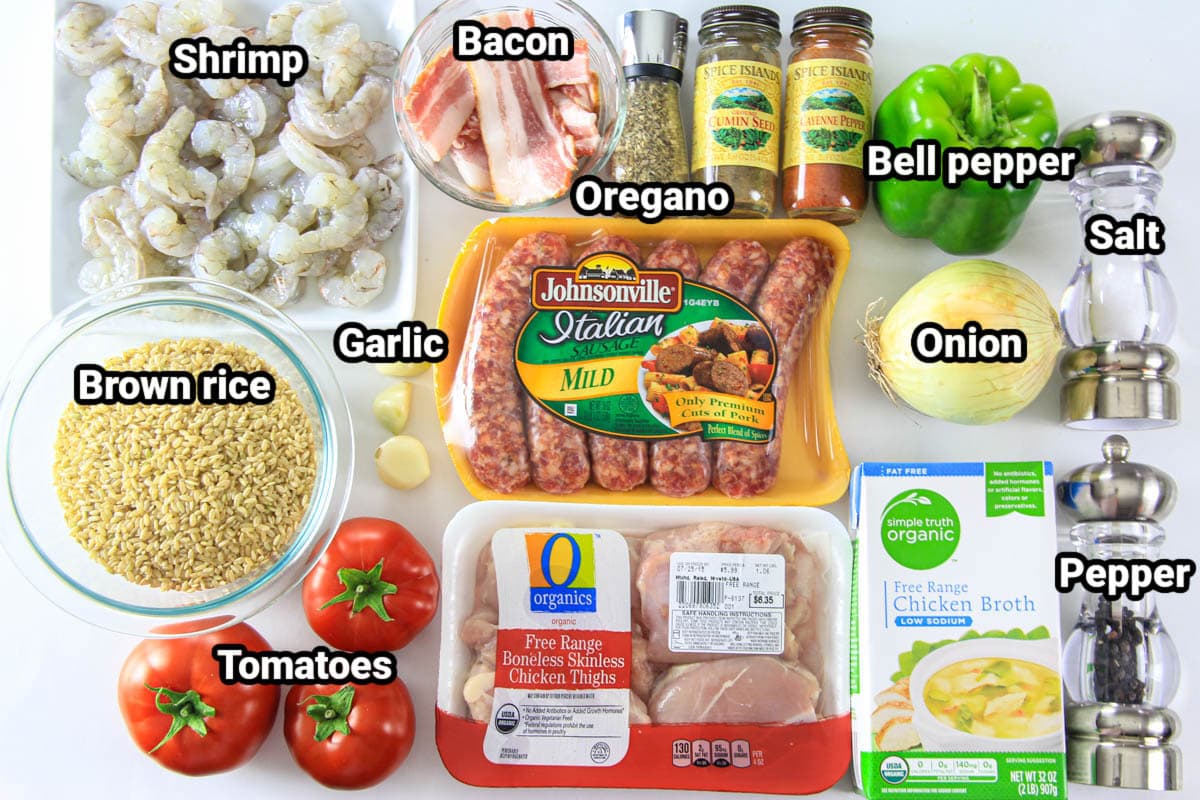 Ingredients for Whole Grain Rice Jambalaya: prawns, bacon, whole grain rice, garlic, bratwurst, tomatoes, poultry, oregano, cumin, cayenne pepper, bell pepper, onion, poultry broth, salt, and ground pepper.